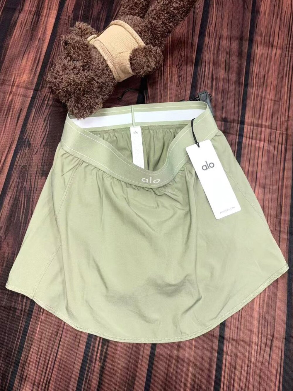 🔥Brand New Alo Yoga Match Point Tennis Skirt (Dune Grass) Women's🪻 - Picture 1 of 8